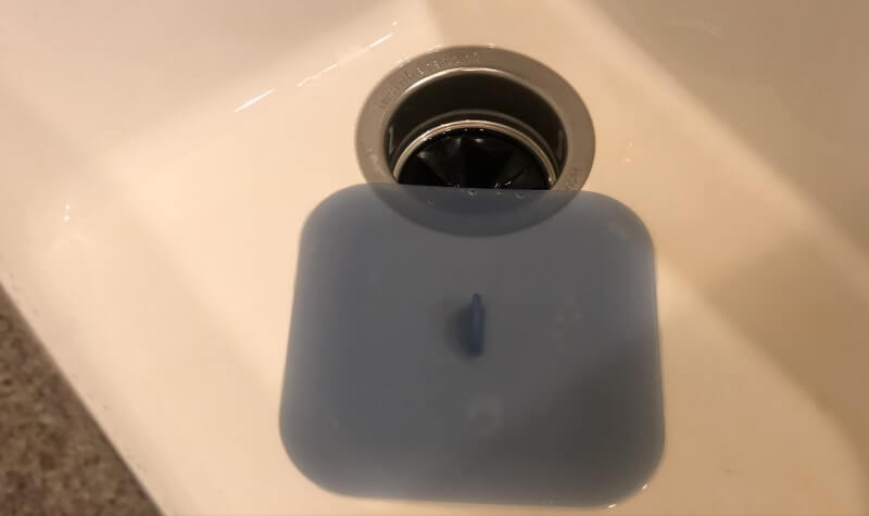 a silicon lid in kitchen sink