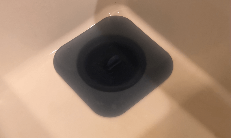 a silicon lid in kitchen sink